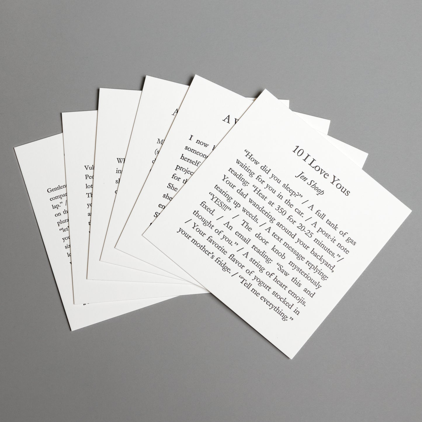 Collection view of six 5×5 letterpress prints featuring original words by Jen Shoop on white paper.