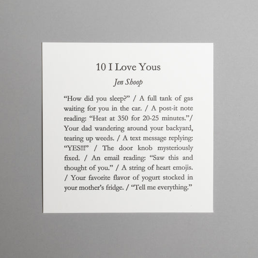 Front view of “10 I Love Yous,” a 5×5 black letterpress print by Jen Shoop on white paper.
