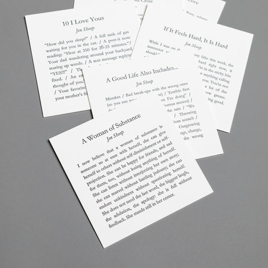 Alternate collection view of Jen Shoop’s six 5×5 letterpress prints with black type on white paper.