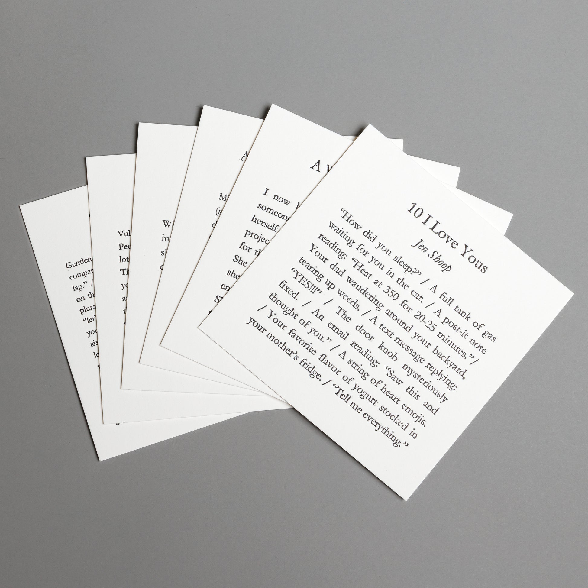 Collection view of six 5×5 letterpress prints featuring original words by Jen Shoop on white paper.