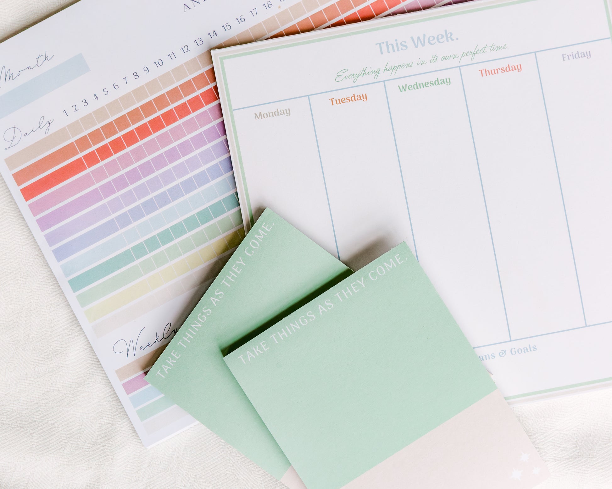 Magpie x Mamey weekly planning pad with habit tracker and notepads in flat lay arrangement